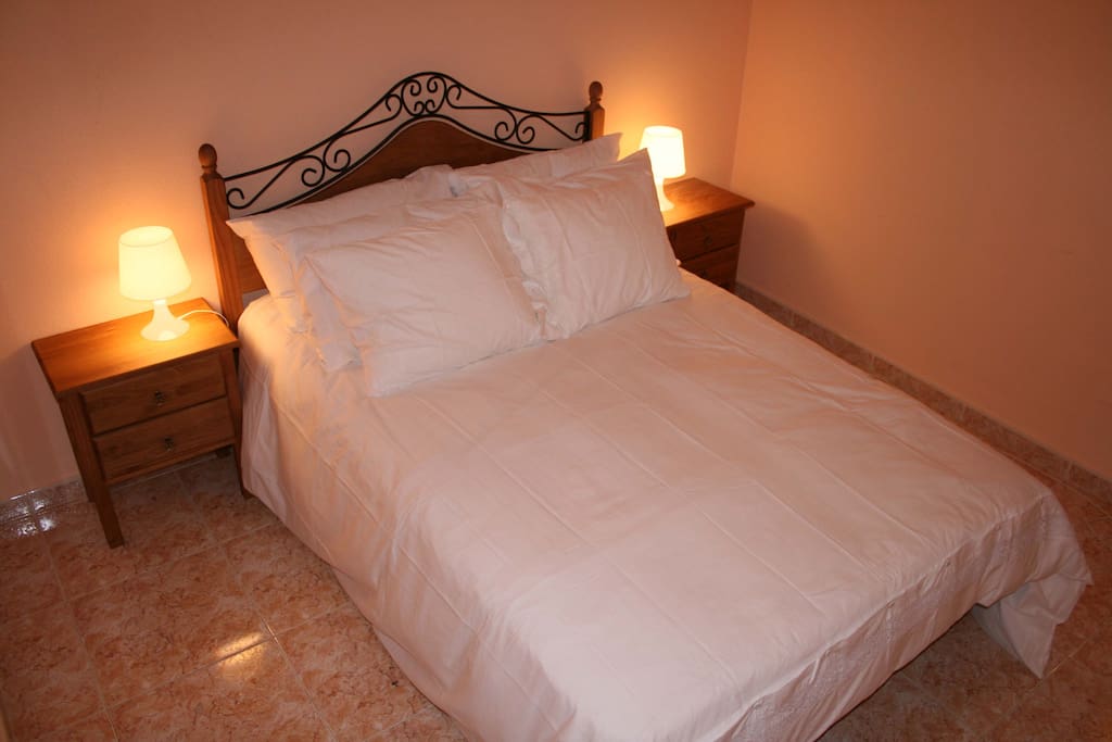 Lovely double bedroom on the ground floor perfect or guests that have trouble with stairs. Ceiling fan above the bed. Access to a downstairs shower room and toilet.
