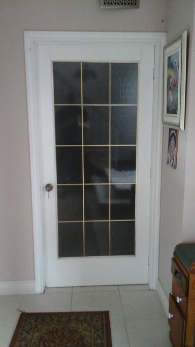 Front door apartment inside entrance lobby