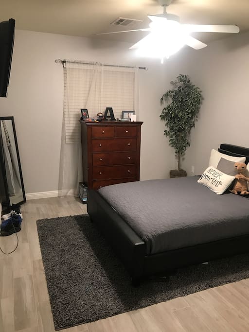 Full size bed, Ceiling Fan and mirrored closet doors.