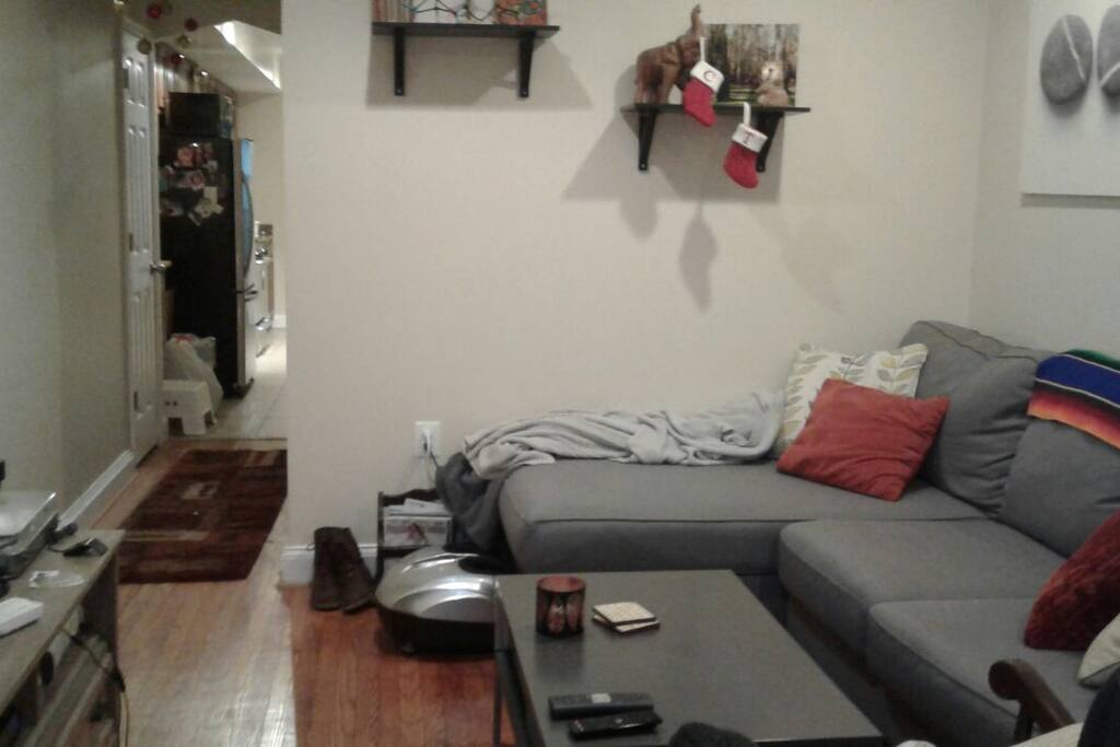 super comfortable living room, complete with a SMART TV that has cable and Netflix, a record player and lots of board games