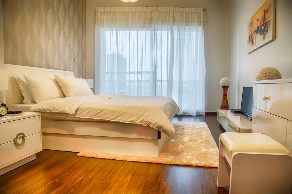 King bed with comfortable mattress. Watch a DVD on the flat screen TV in the bedroom.