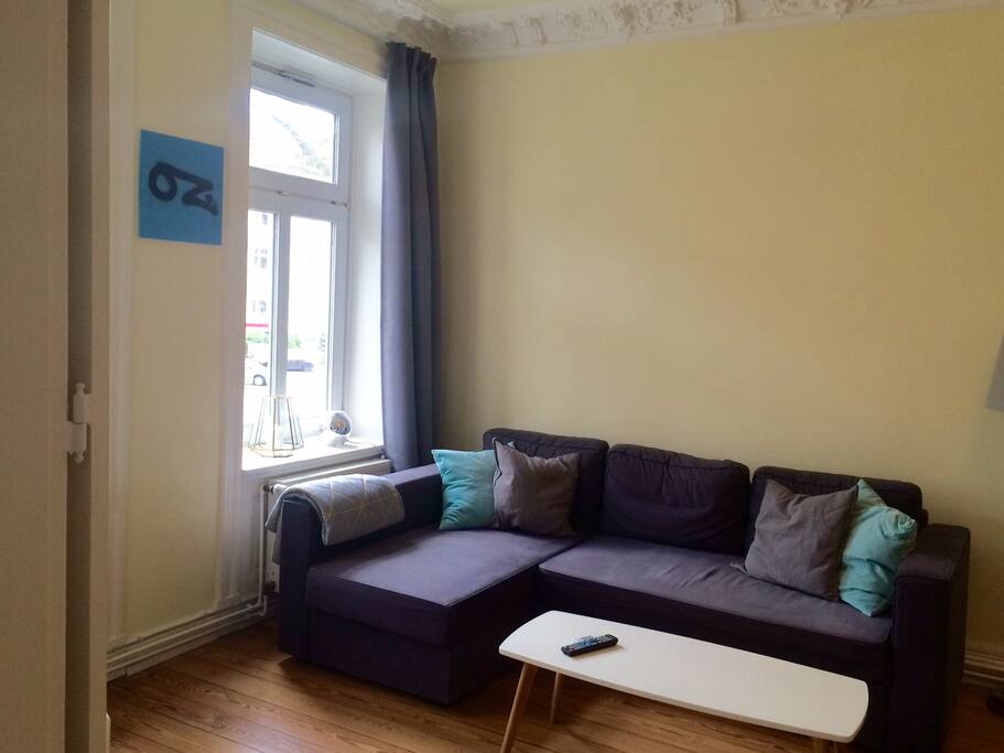 Wohnzimmer mit Schlafsofa