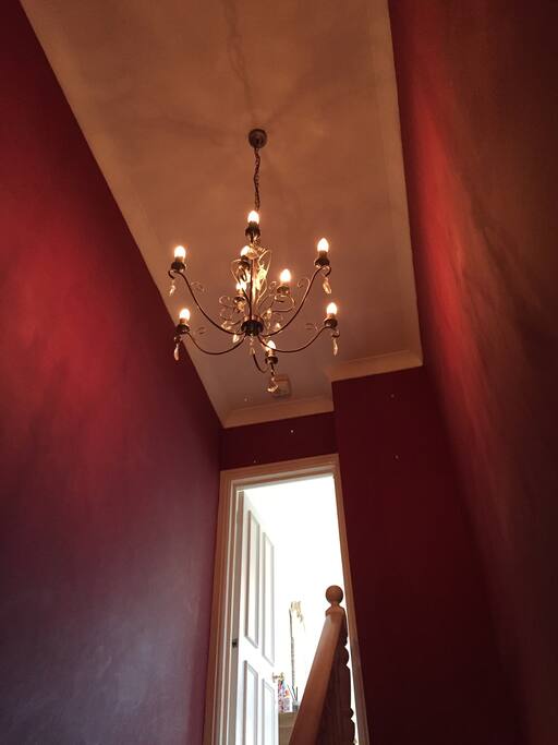 Hallway with chandelier