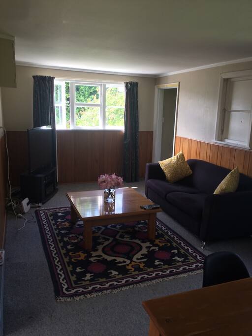 Lounge with Big Screen T.V with Sky. Situated so you can watch t.v in master bedroom
