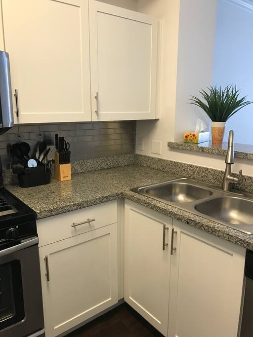 Kitchen comes fully stocked with dinnerware, silverware, cookware and all other necessities to make a home cooked meal