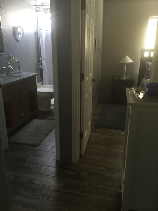 Private shower/bath next to bedroom.