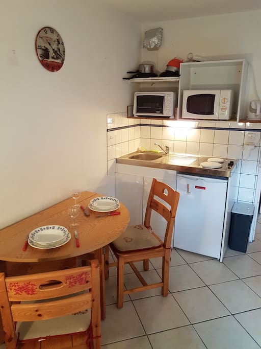 Dining table and kitchen
