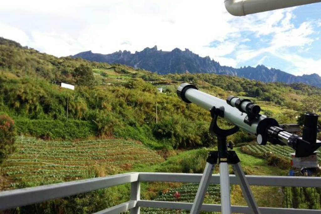 private balcony with mountain view. (Telescope not provided)
