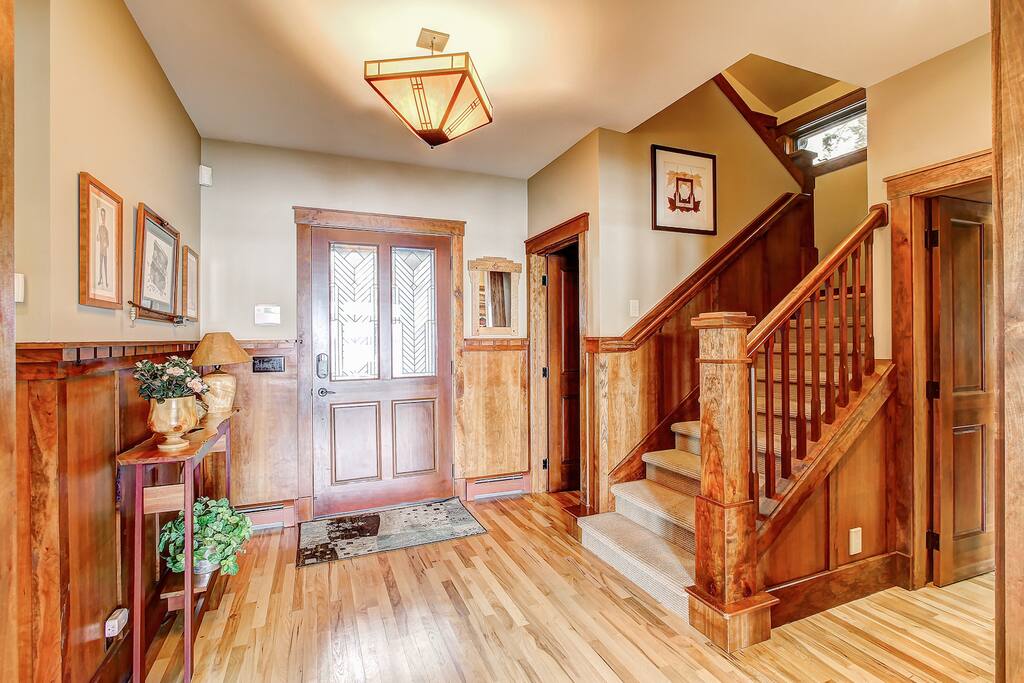 Entryway area - stairs to 2nd floor and garage parking.