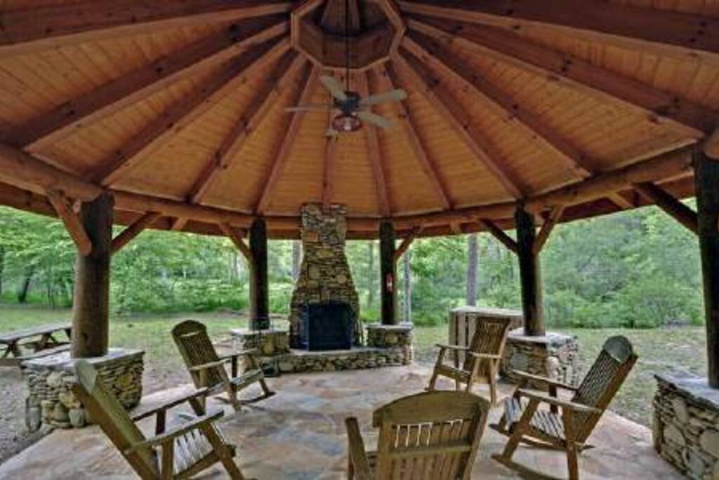 Gazebo down next to the river. has a wood burning fireplace with rocking chairs (reminder to pick up a fire bundle on the way to the cabin).