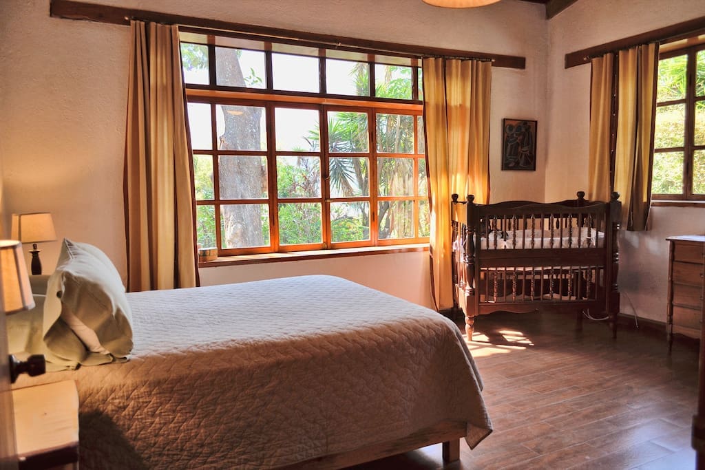 Master Room with Queen bed. Crib can be moved