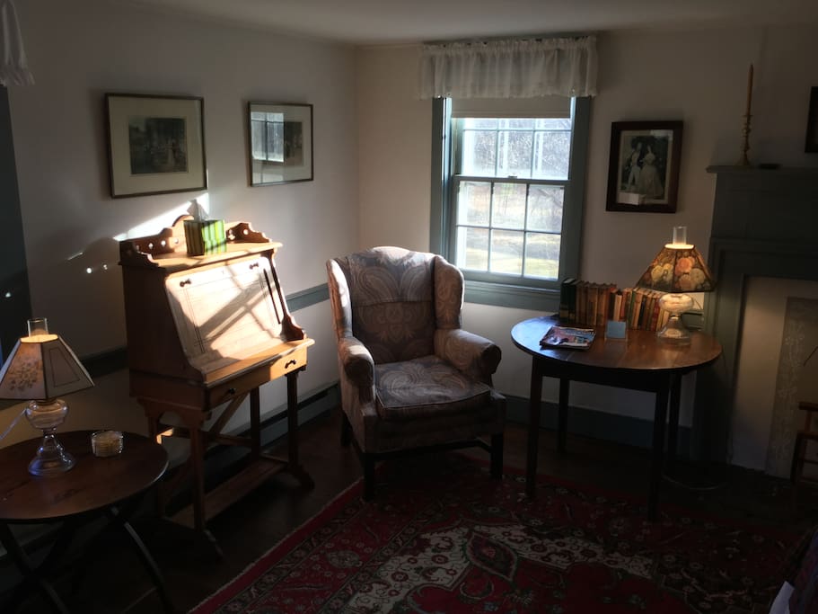 Mary Street's writing desk, comfortable reading chair, table