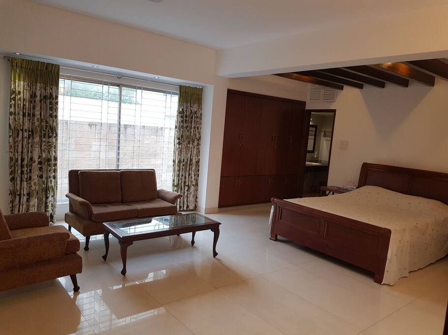 bed room 1, proper sofa set , long window, 1 queen size bed,1 cupboard,attached toilet