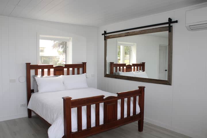 Queen bed in open lower level, new bedding with matress topper will ensure a fantastic sleep, lie in bed and watch the dairy cows graze 