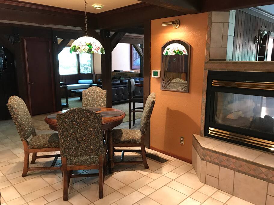 Multi purpose table off kitchen & gas fireplace