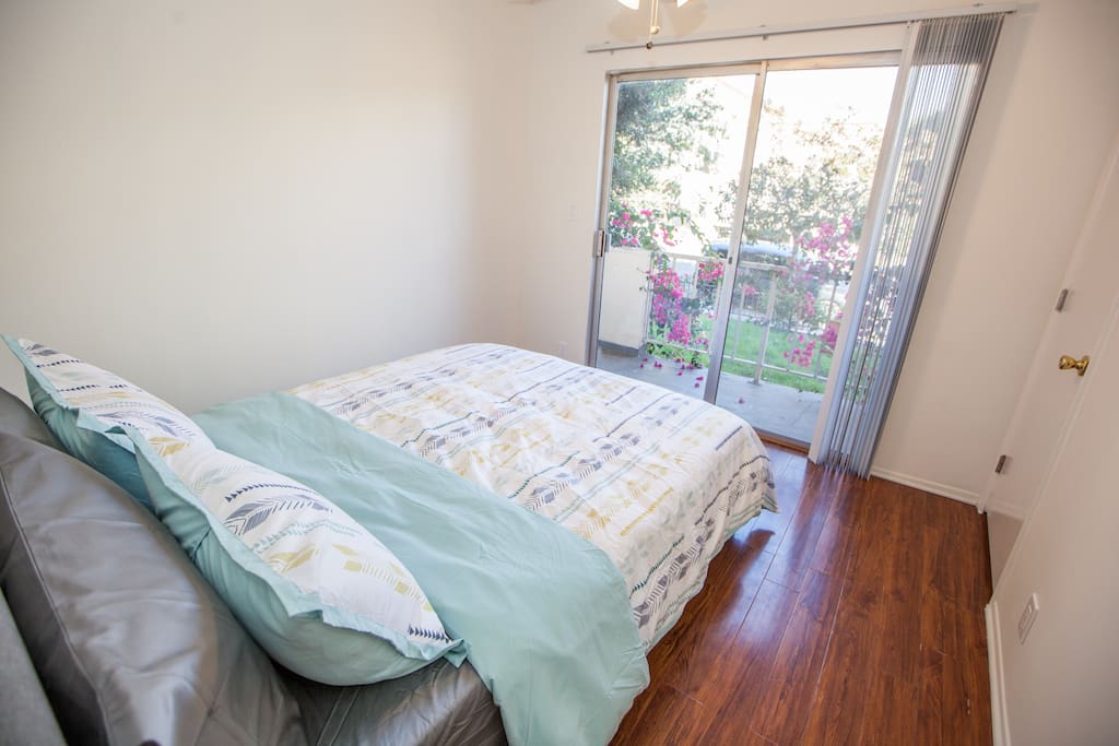 Bedroom #2 - Wake up and enjoy a beautiful flower filled balcony