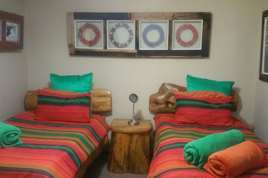 Very spaciois second bedroom with 2 single beds and huge amounts of cupboard space and great views of the garden