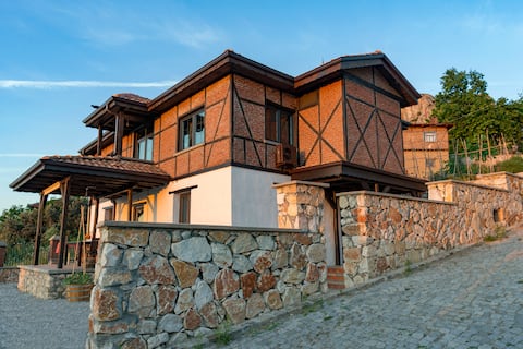 Enjoy the stunning lake view at Korpus Guest House