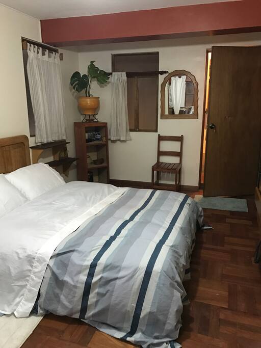 Queen bed with down comforter