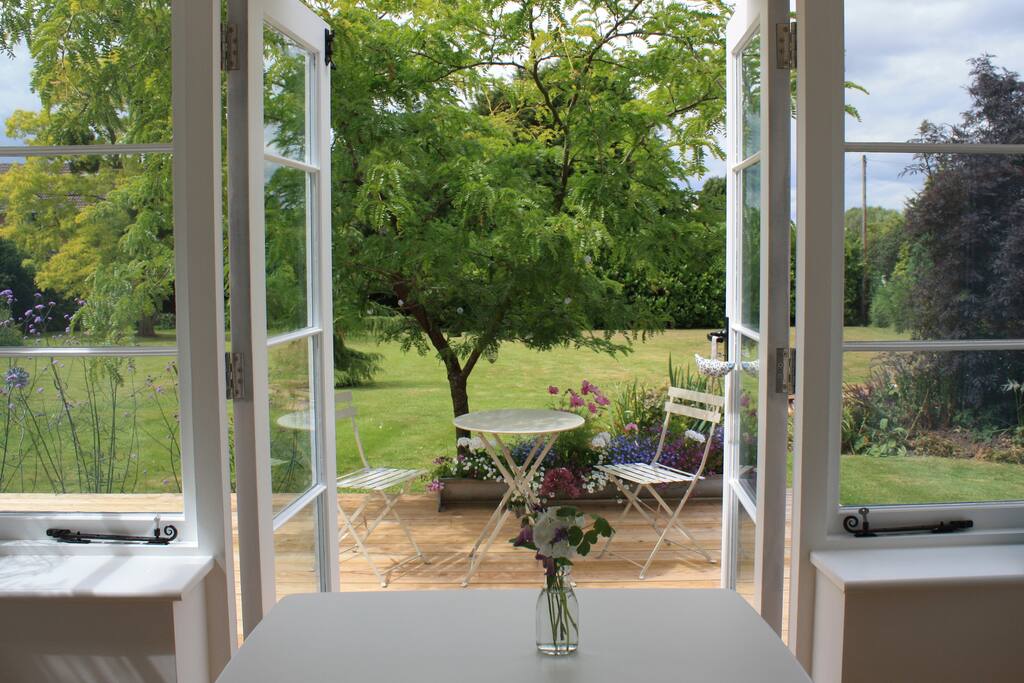 French doors leading onto decked area