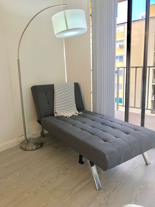 This chair can open to a sleeping bed.