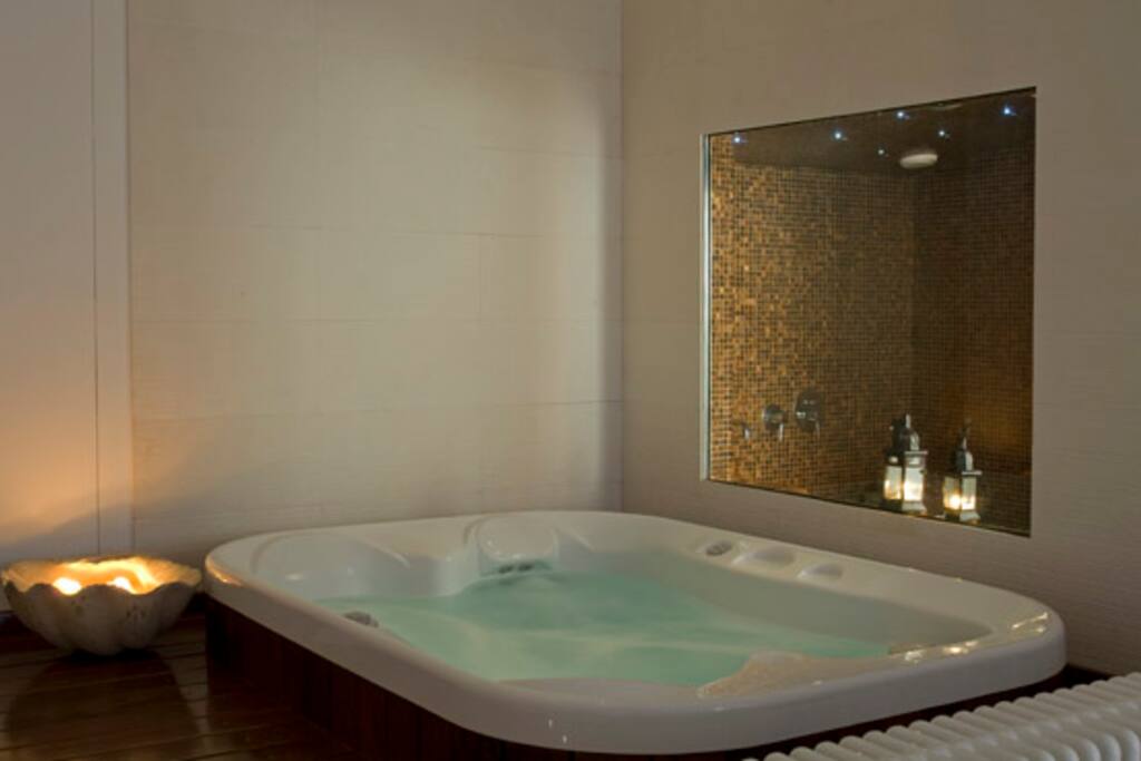 The spa area provides a hydromassage suitable for up to four people