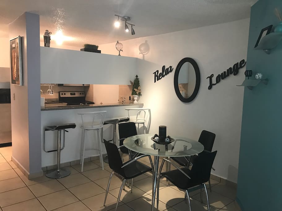 Dining area and kitchen bar.