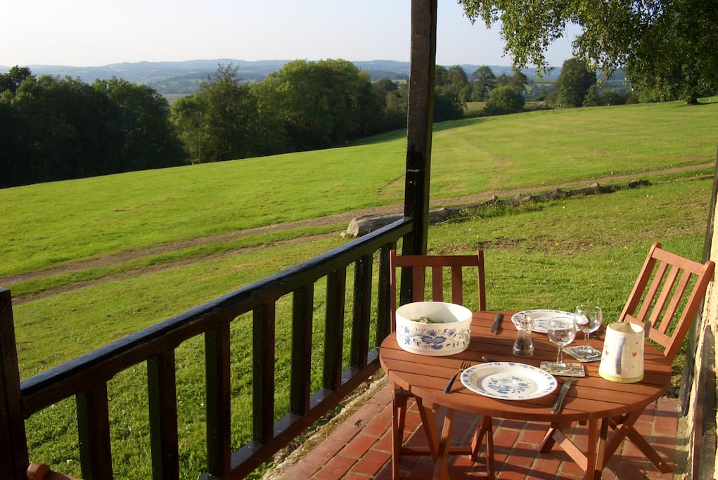 Cedia open veranda seating view with hardwood furniture