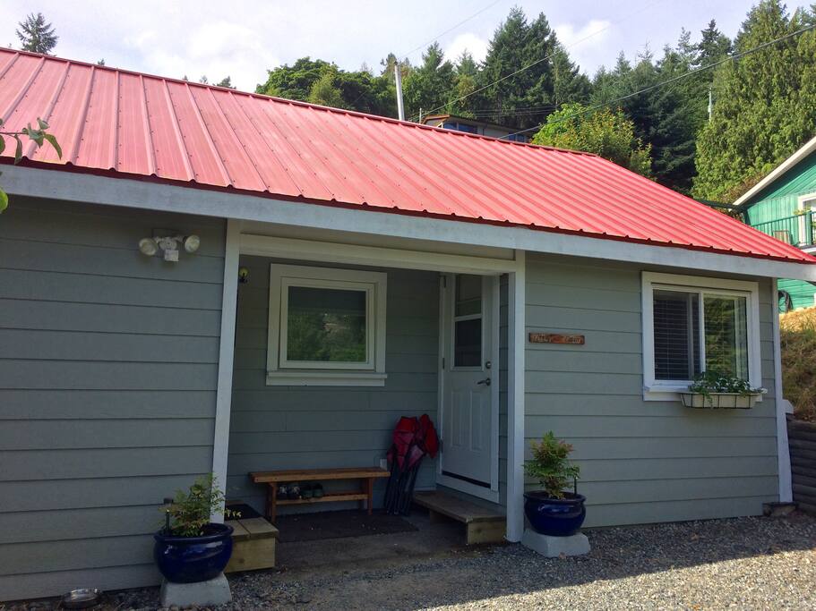 Cabin split in two with Little Red located to the right...