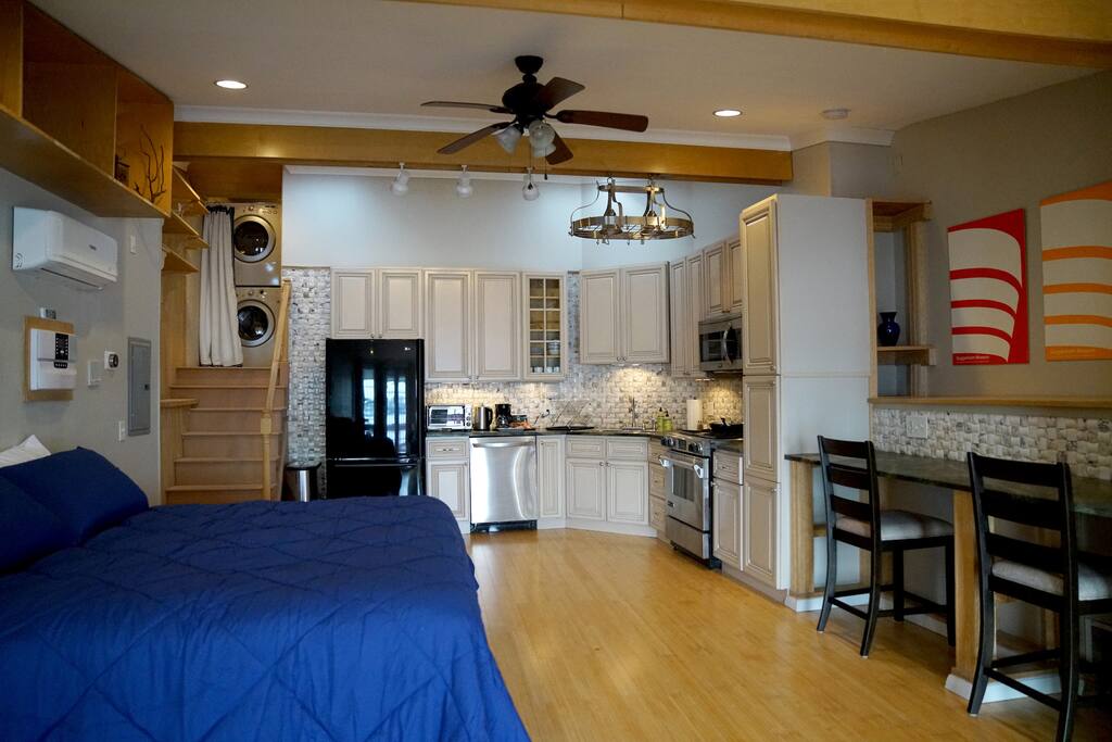 View toward your kitchen and up the stairs to the bath