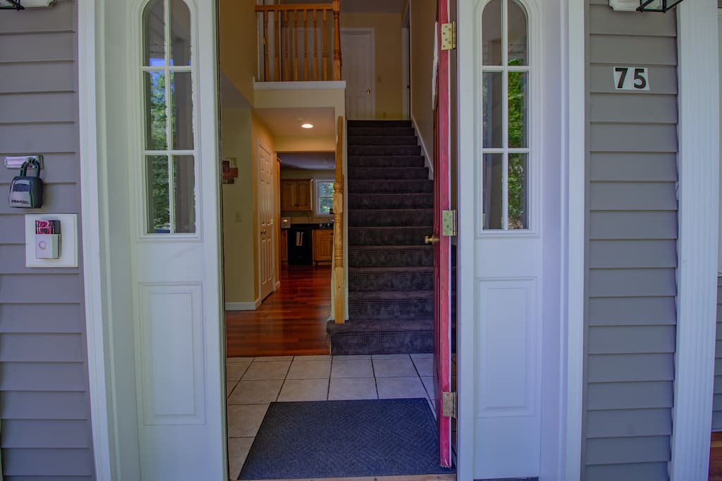 Entrance with stairs to second floor space.