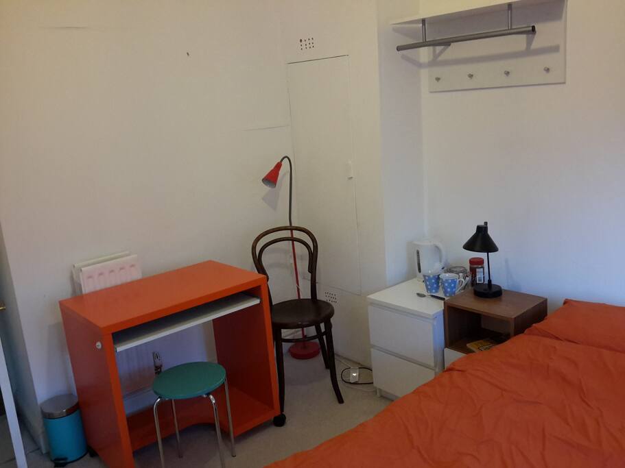 The bedroom - with desk and tea and coffee making facilities.