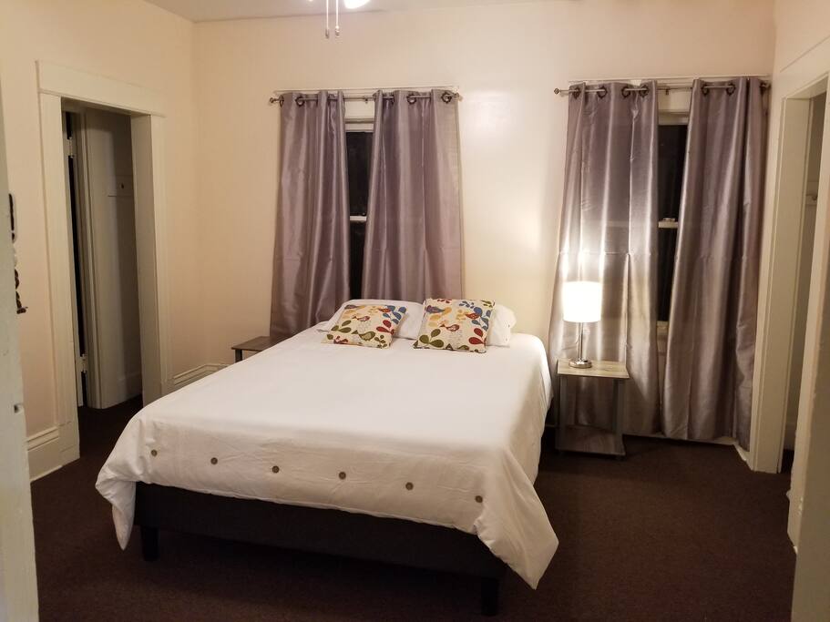 Large bedroom 1: Note the connecting door between rooms can be locked or left open, per your preference. Traveling families love this feature!