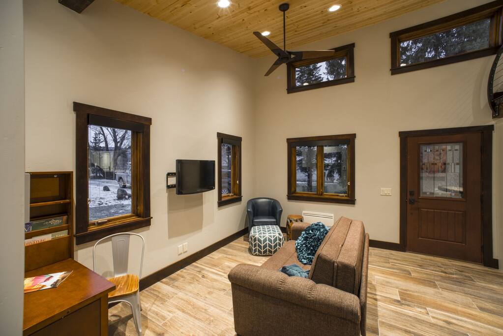 Living room with flat screen LED Smart TV.