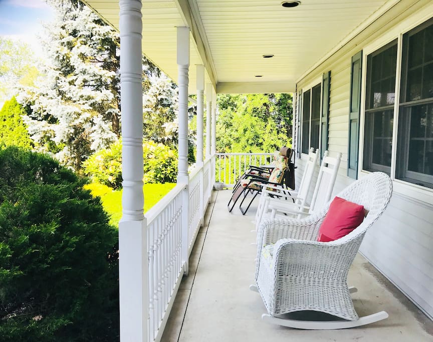 Beautiful front porch with rocking chairs