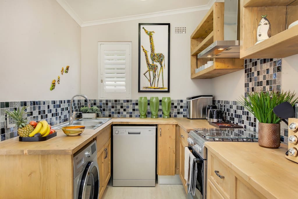 Fully furnished kitchen with washer-dryer and dishwasher