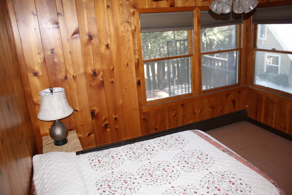 Bedroom #1. Full size bed, ceiling fan, built in dresser, nightstand, and closet.
