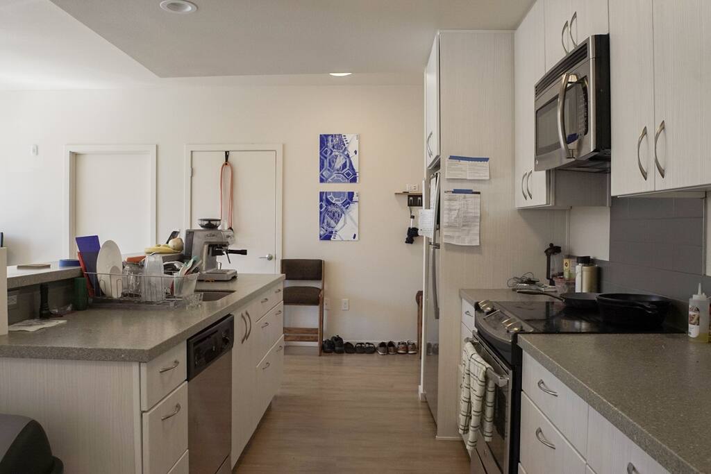 Modern kitchen will all standard appliances (and more! Including excellent espresso machine)