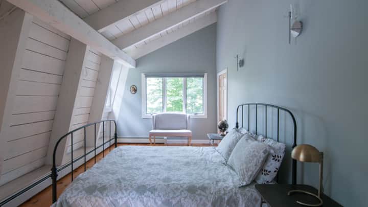 Upstairs Guest Bedroom with a King size bed.