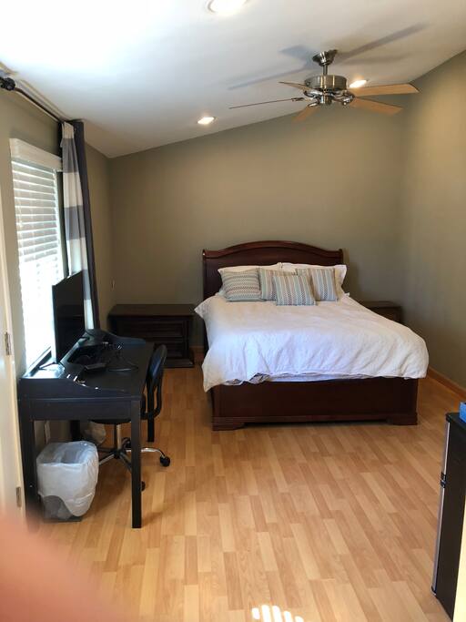 Queen size bed and office desk