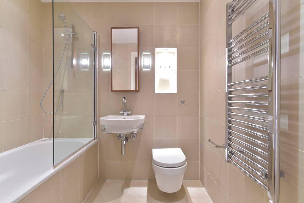 Bathroom with shower over bath