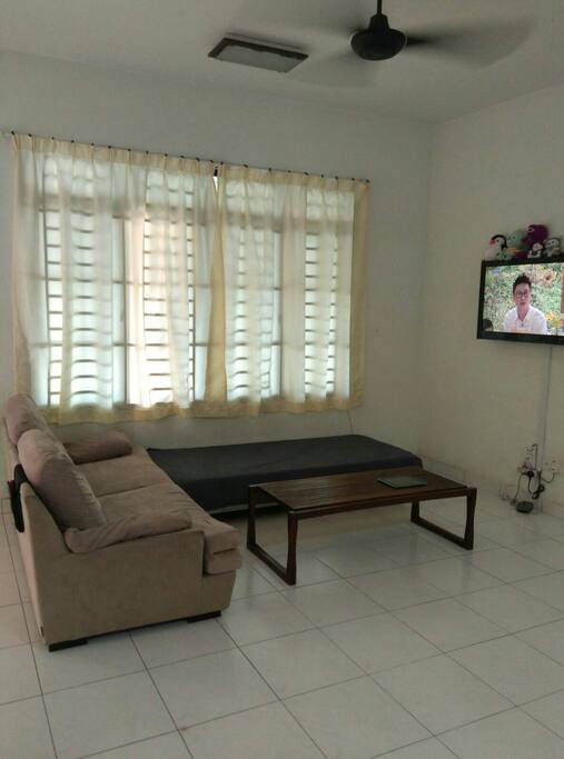 Living room with 40" LED TV and sofas,coffee table