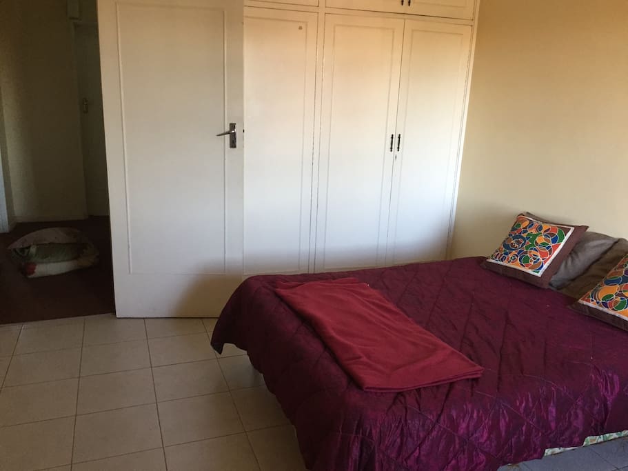 Room opens onto other living quarters in the home - you share the top floor with two other bedrooms and a shared bathroom.