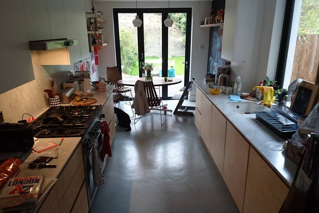 Kitchen with hidden dishwasher and washing machine