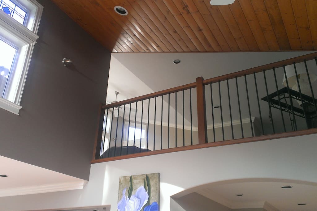 Loft opens onto deck which allows early morning coffee while enjoying the morning sunrise.