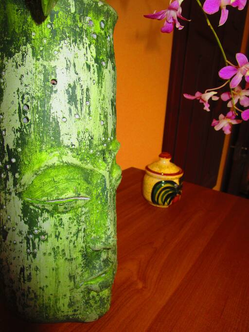 Flower arrangement atop wardrobe