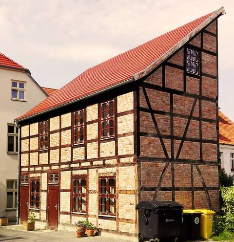 Charmingly reconstructed half-timbered building (central)