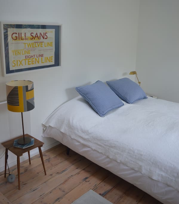 Two single beds made as a double. Flexible sleeping space.