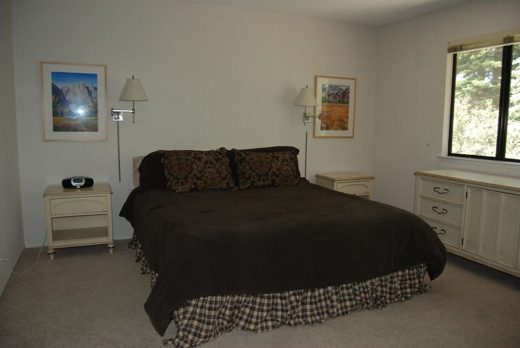 Two bedrooms, including the master shown here, have king-size beds.