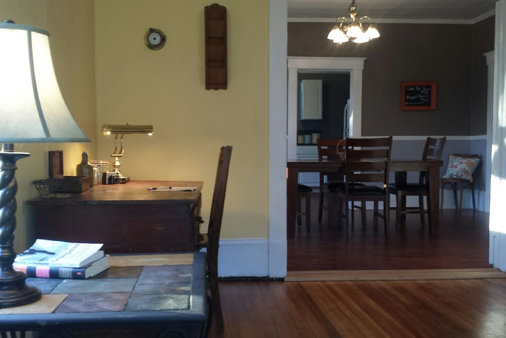 Living room looking into the dining room and doorway to the kitchen.